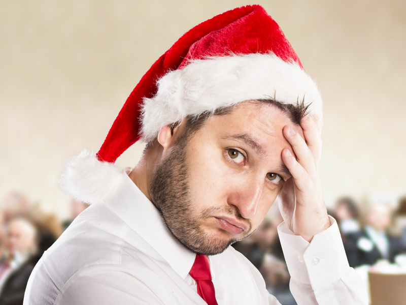 Man showing stress of Christmas